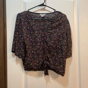 Medium size. From Arizona. Purple and Black. Knot at the bottom middle.